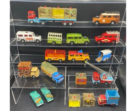 Mixed Lot of Corgi Land Rovers, Chipperfield's, and Circus Menagerie. 12 total items.(2700g)Includes cages and animal figures