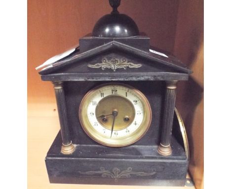 Victorian striking mantle clock in black marble case
