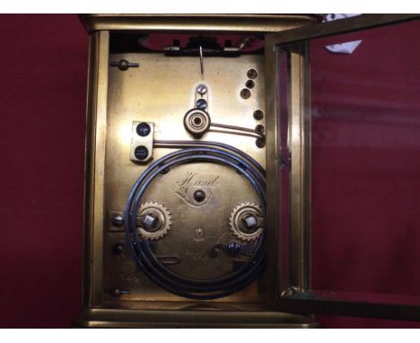 Late 19th Century French brass repeater carriage clock, Henri Jacot, with key, stamped on reverse Made in Paris with Parrot s