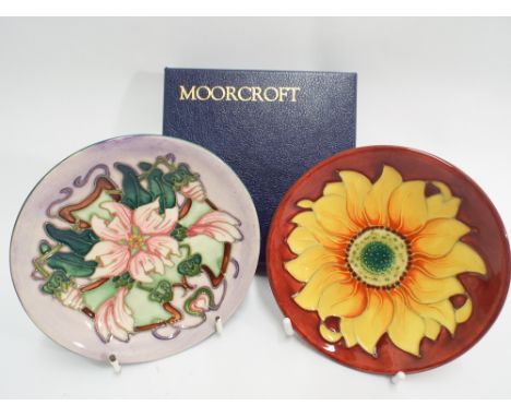 Two Moorcroft circular pin trays, Inca and Mallow  Condition - as new with boxes 
