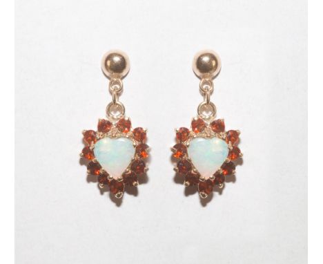 Pair of 9ct gold opal and garnet cluster earrings, modelled as hearts with gold posts. 