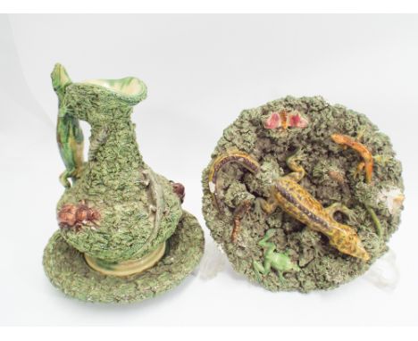 Portuguese pottery jug and basin set and a similar wall plate decorated with lizards, frogs, bugs, some damages 