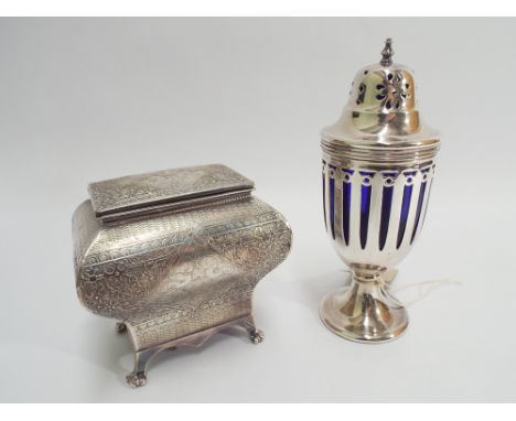 Silver plated tea caddy impressed WWH & Co EP together with silver plated sugar shaker with blue glass liner 