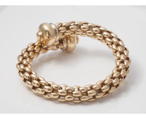 Fope Italian designer bangle, in 18ct yellow gold with two tone gold finials, hallmarked, 750 & makers name Fope, weight 56.1