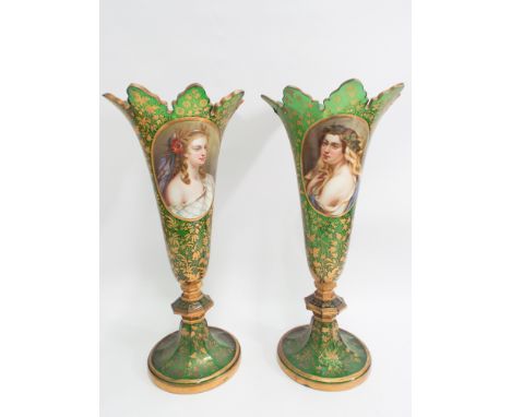 Tall pair of green Bohemian vases with oval painted portrait reserves depicting maidens with poppies in her hair, the other w