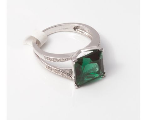 Modern 9ct white gold dress ring set with diamonds and a square green quartz