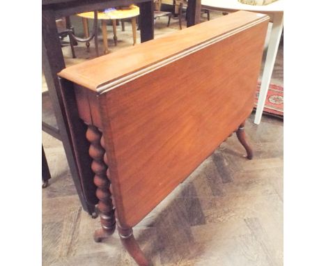 Late Victorian mahogany Sutherland dining table with gate leg mechanism and unusual bobbin turned legs 