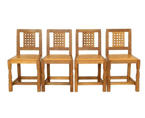 Workshop of Robert Mouseman Thompson (Kilburn): A Set of Eight (6+2) English Oak Lattice-Back Dining Chairs, tan cow hide sea