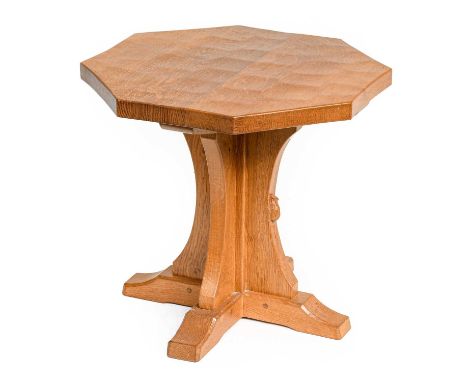 Workshop of Robert Mouseman Thompson (Kilburn): An English Oak Octagonal Coffee Table, adzed top, on a cruciform base, with c