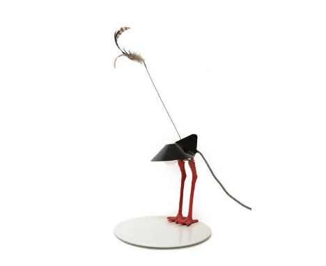 A Limited Edition Bibibibi Table Lamp, by Ingo Maurer, 1982, with feathers on a long stem above a black round tin shade, abov