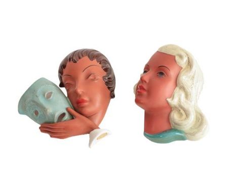 A Goldscheider Pottery Wall Mask, model No.8935, of a woman holding a mask, glazed in colours, printed and impressed marks, o