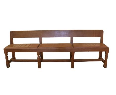 Workshop of Robert Mouseman Thompson (Kilburn): A Pair of English Oak Hallway Benches, circa 1960s, plank backs, upholstered 