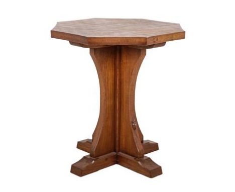 Workshop of Robert Mouseman Thompson (Kilburn): An English Oak Octagonal Side/Pub Table, on cruciform base, with carved mouse