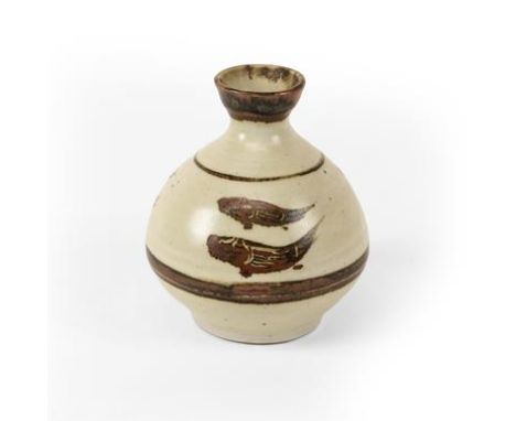 Bernard Leach (1887-1979): A Porcelain Vase, circa 1958, iron brushed with two fish repeated three times, between horizontal 