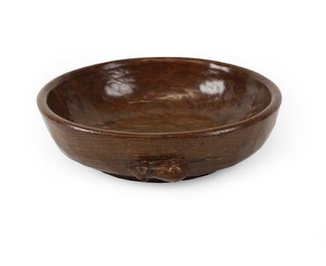 Robert Mouseman Thompson (1876-1955): An English Oak Fruit Bowl, tooled exterior and interior, with carved mouse trademark to