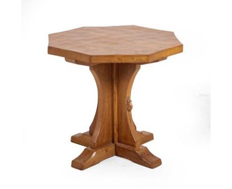 Workshop of Robert Mouseman Thompson (Kilburn): An English Oak Octagonal Coffee Table, adzed top, on a cruciform base, with c