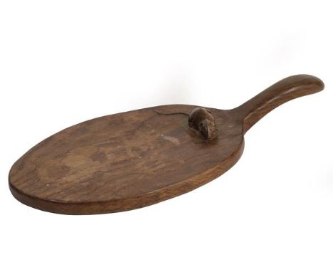 Robert Mouseman Thompson (1876-1955): An English Oak Cheese Board, of standard form, with carved mouse trademark on the board