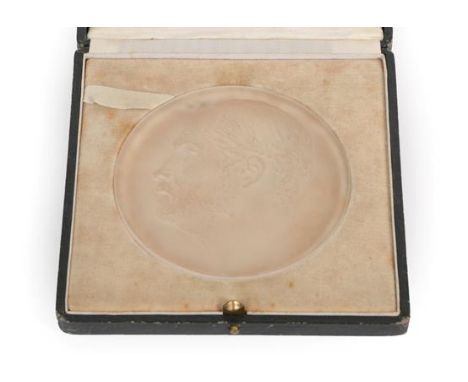 René Lalique (French, 1860-1945): A Frosted Glass Portrait Medallion, moulded with the profile of Louis Pasteur, moulded mark
