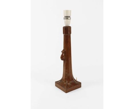 Robert Mouseman Thompson (1876-1955): An English Oak Table Lamp, octagonal column on a square base, with carved mouse tradema