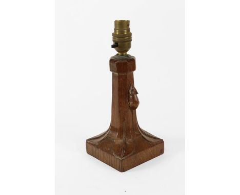 Robert Mouseman Thompson (1876-1955): An English Oak Table Lamp, octagonal column on a square base, with carved mouse tradema