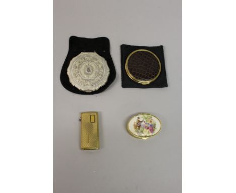 A RONSON LIGHTER, oval pin bar and two compacts.