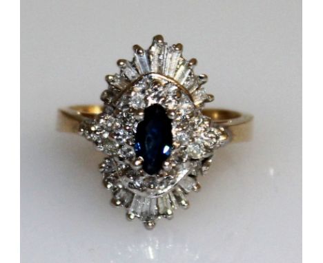 A GOOD SAPPHIRE AND DIAMOND CLUSTER RING set in 14ct yellow gold.