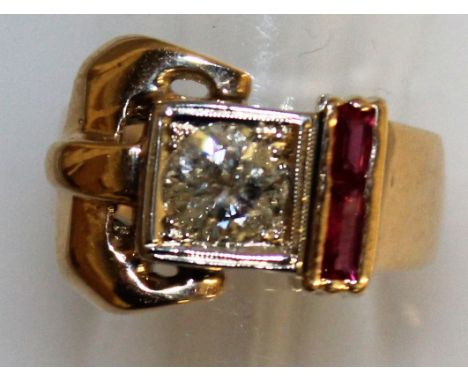 A SQUARE DIAMOND BUCKLE RING set in yellow gold.