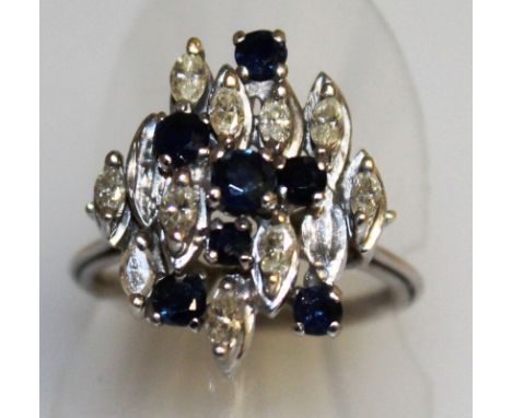 A NICE SAPPHIRE AND DIAMOND FANCY RING set in white gold.