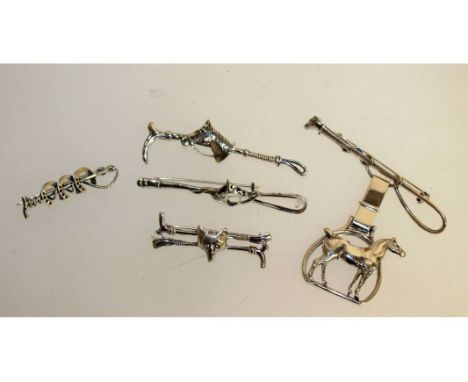 FIVE SILVER "HUNTING" STICK PINS.