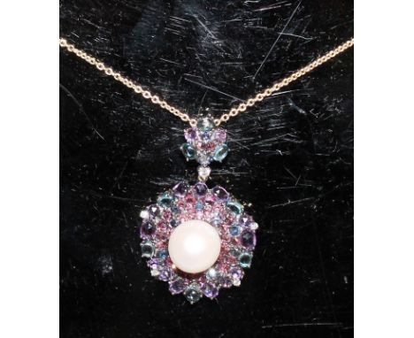 A TOURMALINE, PEARL AND DIAMOND PENDANT, on an 18ct yellow gold 18-inch trace link chain.