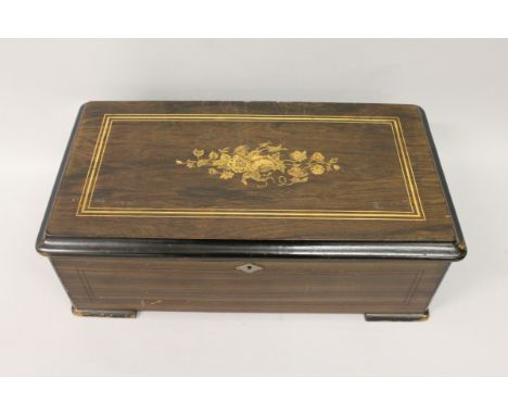 A 19TH CENTURY ROSEWOOD CASED SWISS MUSICAL BOX, playing twelve airs, 9.5-inch drum, no teeth missing, the case inlaid with f