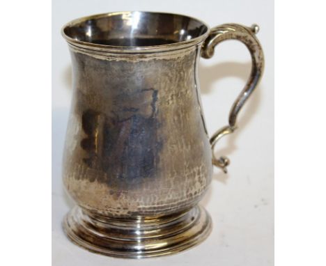 A PLAIN GEORGE III BALUSTER HALF PINT TANKARD, Engraved A.P. London 1763.  Makers Mark: I star M.  Weight: 6ozs.