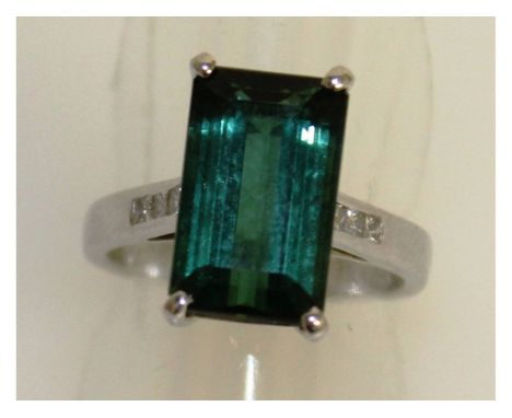 A LARGE TOURMALINE AND DIAMOND SET RING in 18ct white gold.