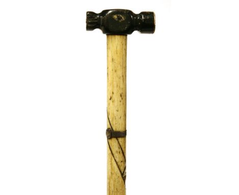 A marine ivory and whalebone walking stick,the baleen hammer head with an inset 20 cent coin, Mauritius, 1877, the shaft spir