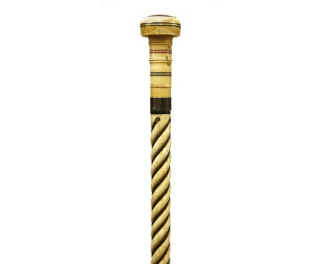 A marine ivory and whalebone walking stick,the compressed turned disc with silver inset engraved with crowned 'H', coloured l