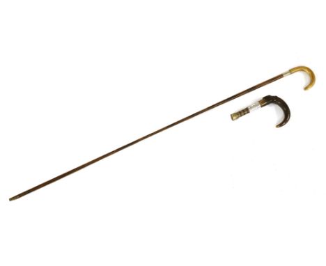 A good horn and silver-mounted walking stick handle,the ferrule hallmarked London 1910,16cm long,together with a slender palm