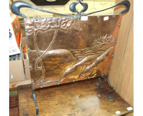 An Arts & Crafts style copper and iron firescreen, 67 cm wide