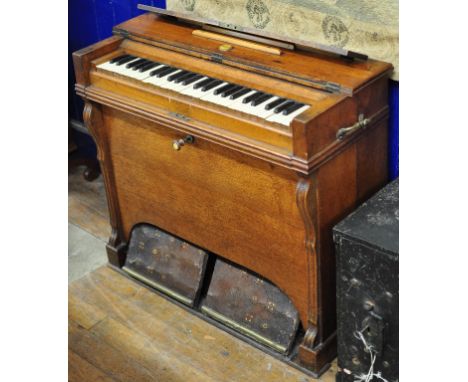 A Debain oak harmonium, 84 cm wide