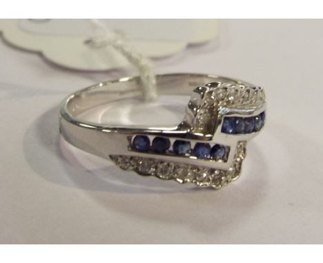 An 18ct white gold and sapphire ring