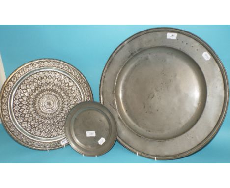A pewter charger, marked R B, 51 cm diameter, and two others (3)