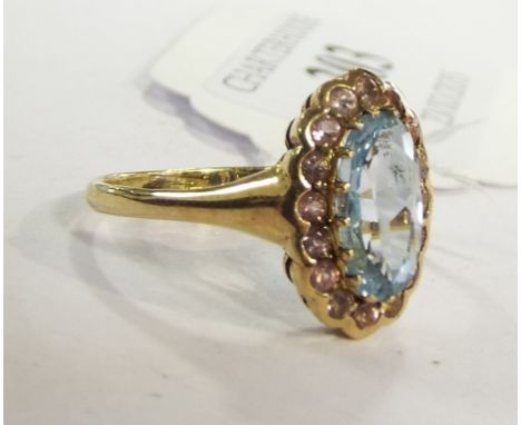 A 9ct gold, aquamarine and pink sapphire ring