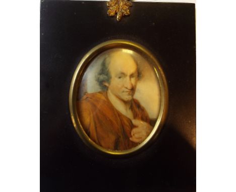 An oval bust portrait miniature, of Oliver Goldsmith, by Dart, watercolour on ivory, inscribed verso, 8 x 6 cm