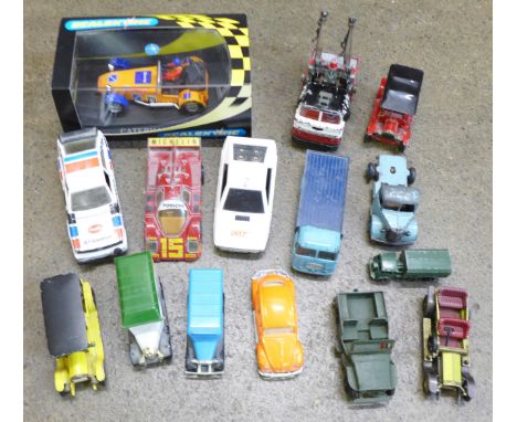 A collection of playworn model vehicles including Corgi and a boxed Scalextric Caterham 7 