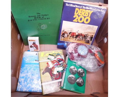 A horse racing winner's blanket with rosettes, Newmarket enamel badges, a Benson and Hedges Book of Racing Colours, First Edi