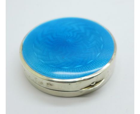 A circular silver and enamel box, Birmingham 1927, 63mm diameter 