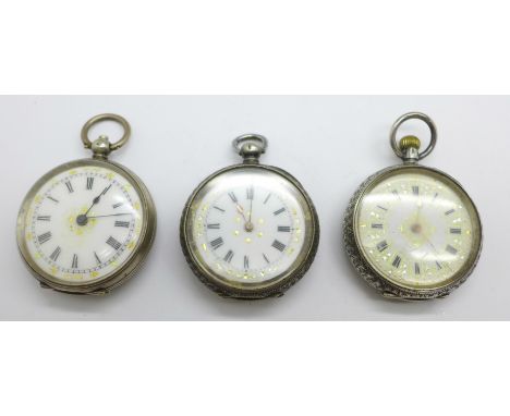 Three silver fob watches, one case back loose 