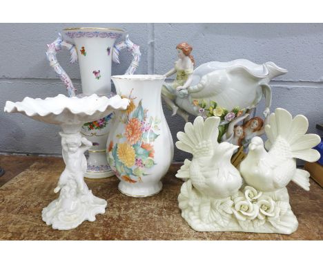 A Copeland Spode pedestal bowl, (stained), a Herend Hungary hand painted vase, a Meissen style centrepiece, a model of two do