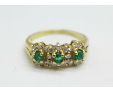 A 9ct gold, emerald and diamond ring, 2.3g, K 