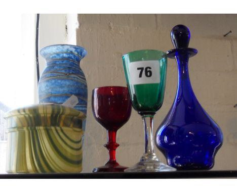 19th c. ruby glass stemmed port wine glass, another in green, a blue glass scent bottle, an Art Deco striated celluloid powde