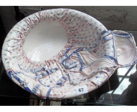 Cors Its Ceramics of Ireland wash basin with soap dish with relief decoration in the form of a petticoat and suspenders